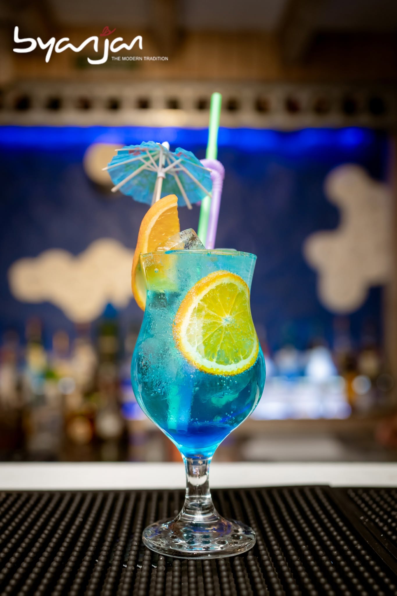 A tall citrus drink at Byanjan