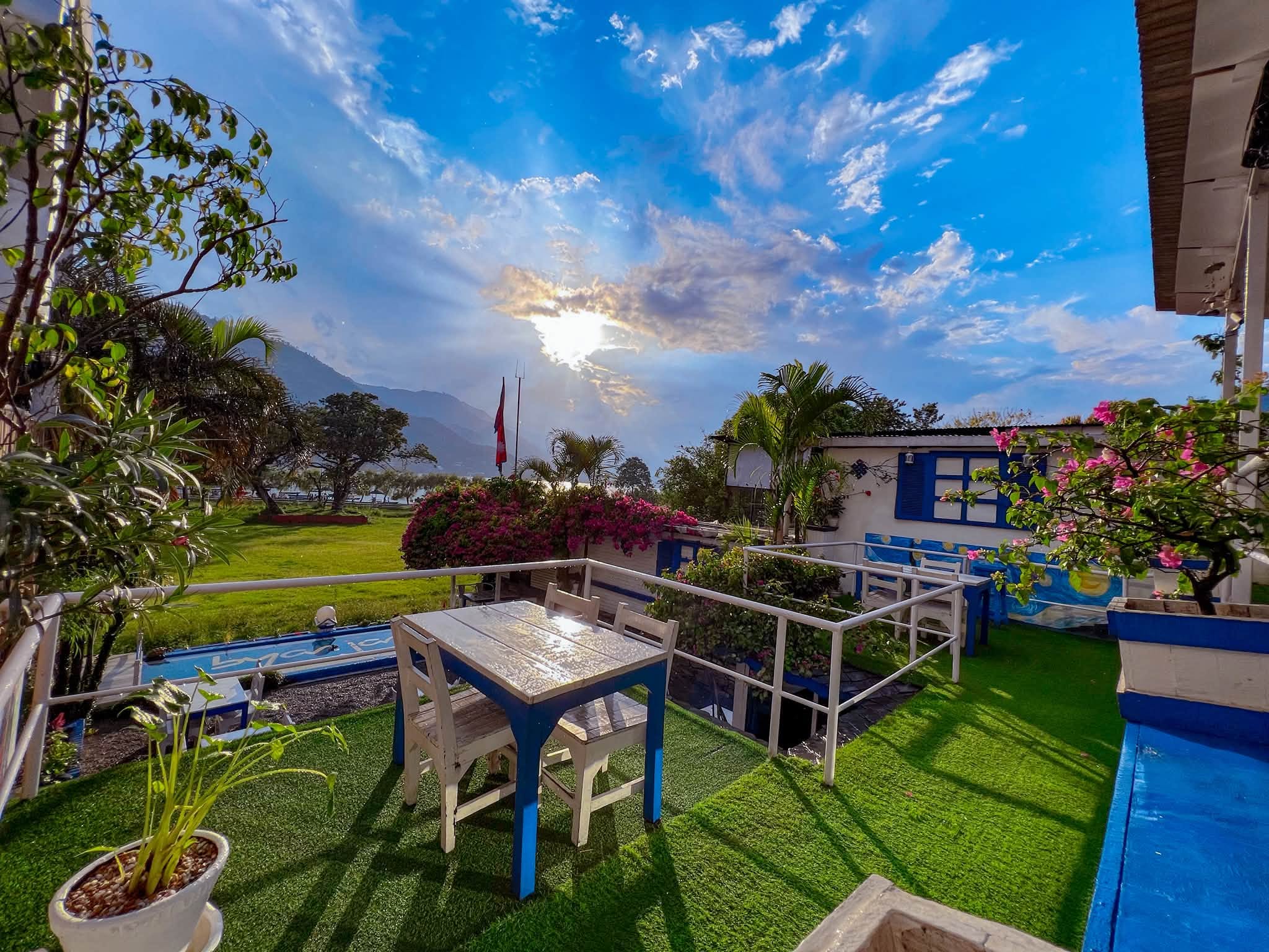 Blue skies and green hills beyond the Byanjan terrace